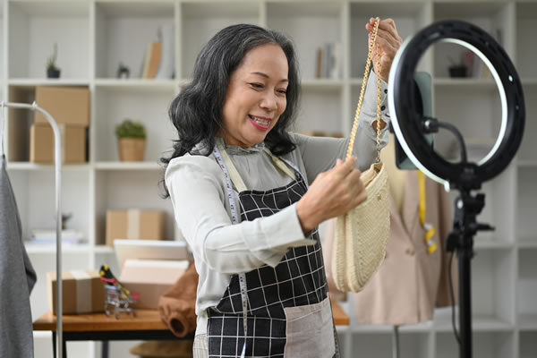 image of woman holding products