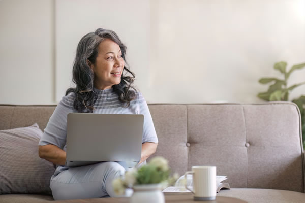 lifestyle woman working on the couch